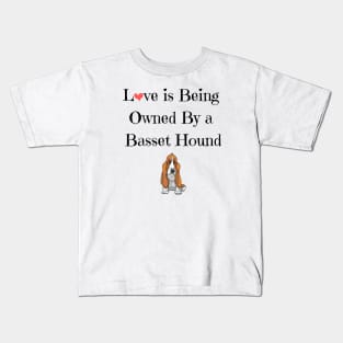 Love is being owned by a basset hound t-shirt Kids T-Shirt